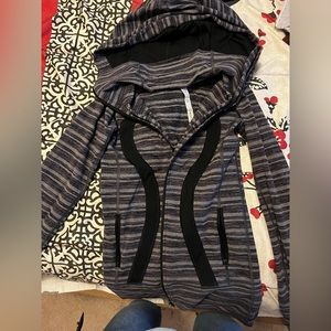 Size 2. Lulu lemon zip up great condition zippers work no stains